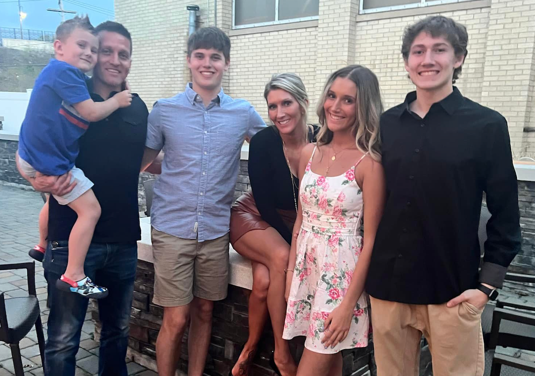 Chad Clark with his wife and children